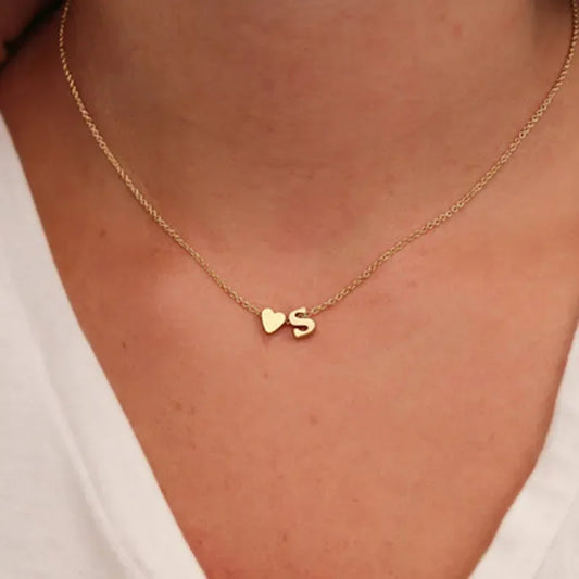 Tiny heart initial necklace in gold